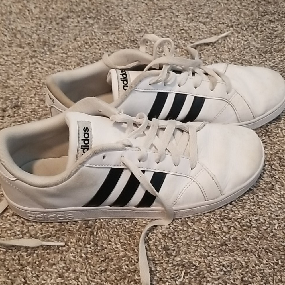 Adidas white leather shoes with black stripe